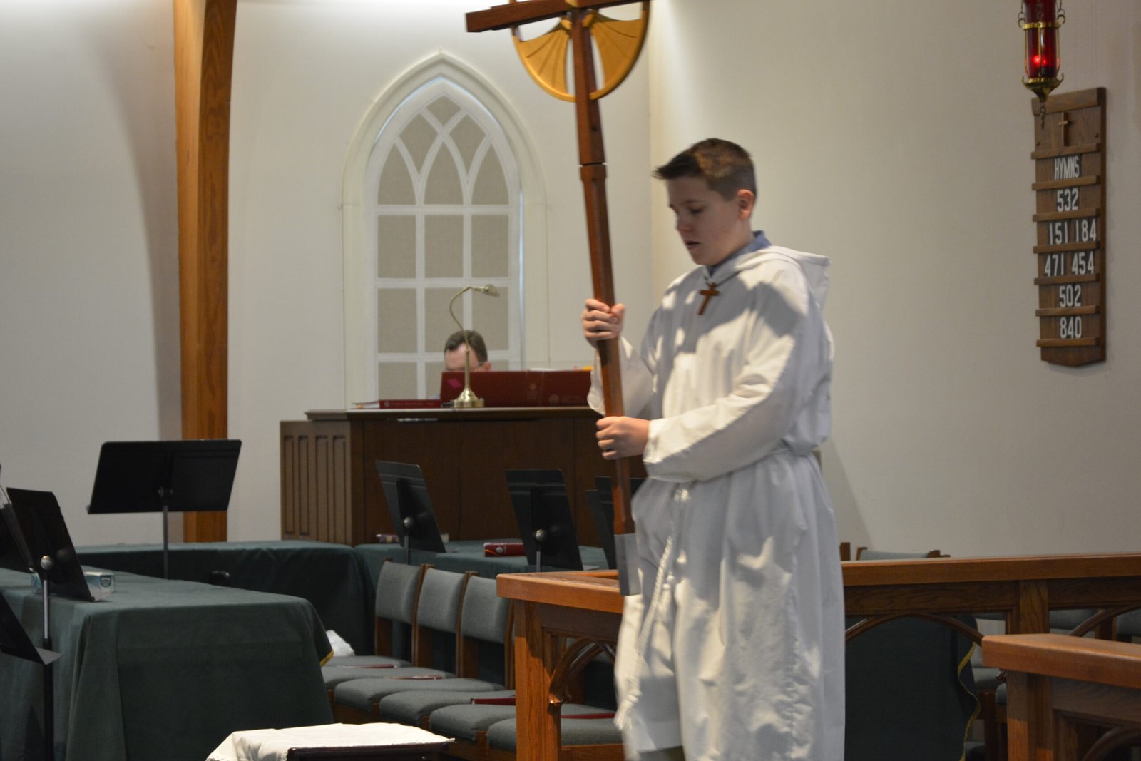 Crucifer carrying cross