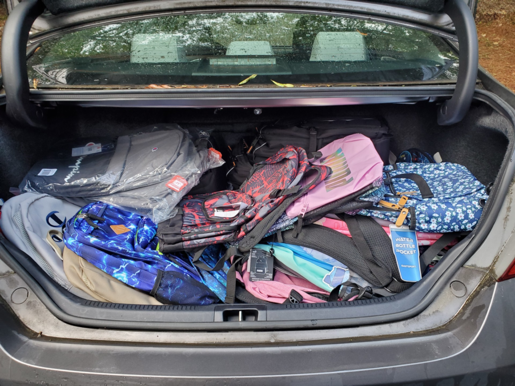 trunk full of backpacks